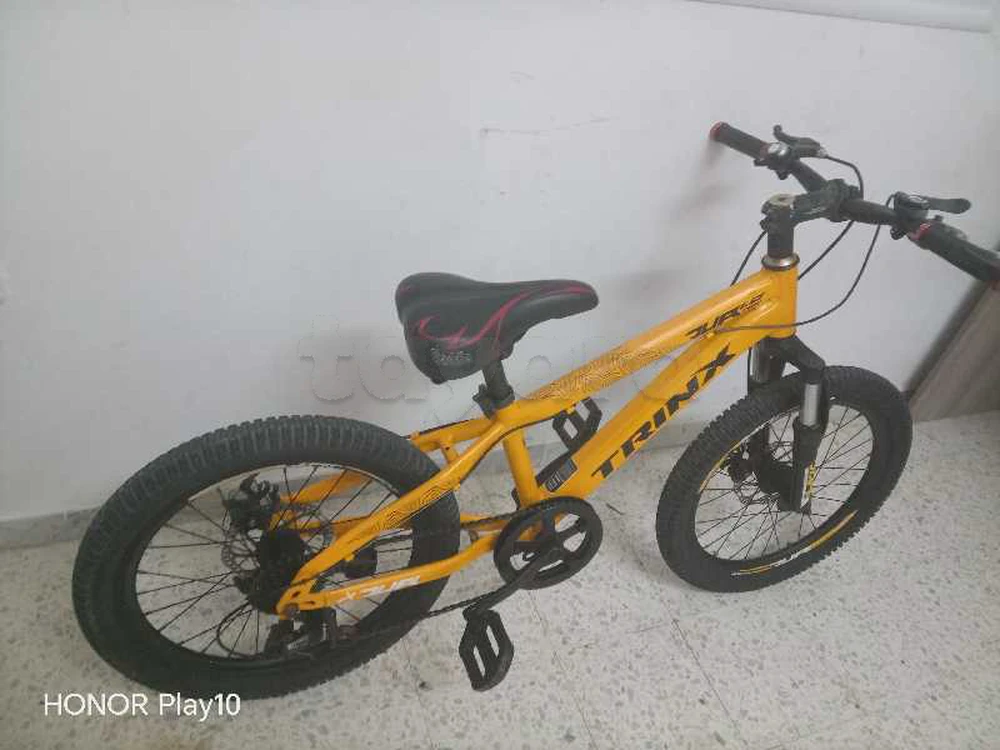 vélo à vendre trix junior avec 6 vitesses 250 dt Tel 24881815
