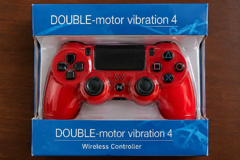 ​Manette PS4 - Tout neuve sous emballage