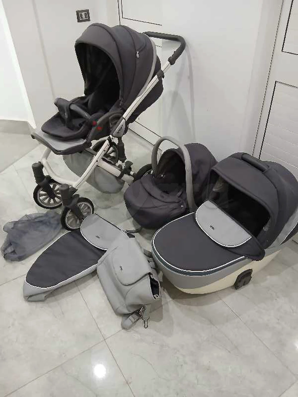 poussette Trio importé état comme neuf
