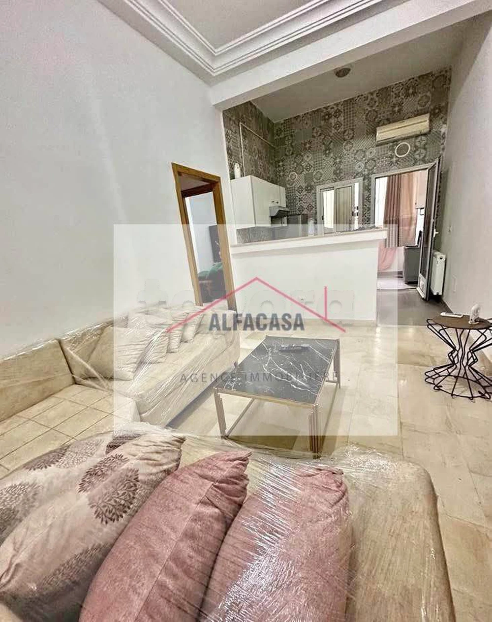 A VENDRE UN APPARTEMENT S+1 HAUT STANDING A CITE EL WAHAT L'AOUINA.