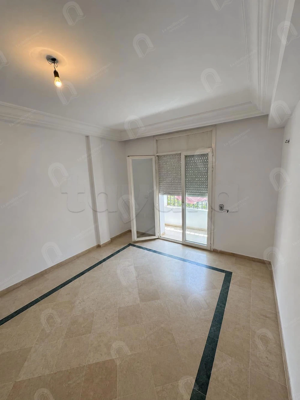 A vendre appartement S+2 situé au Rdc au bardo 2 ras tabia