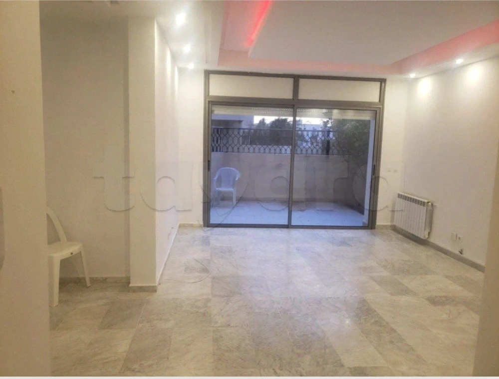 À Vendre – Appartement S+2 avec jardin et parking