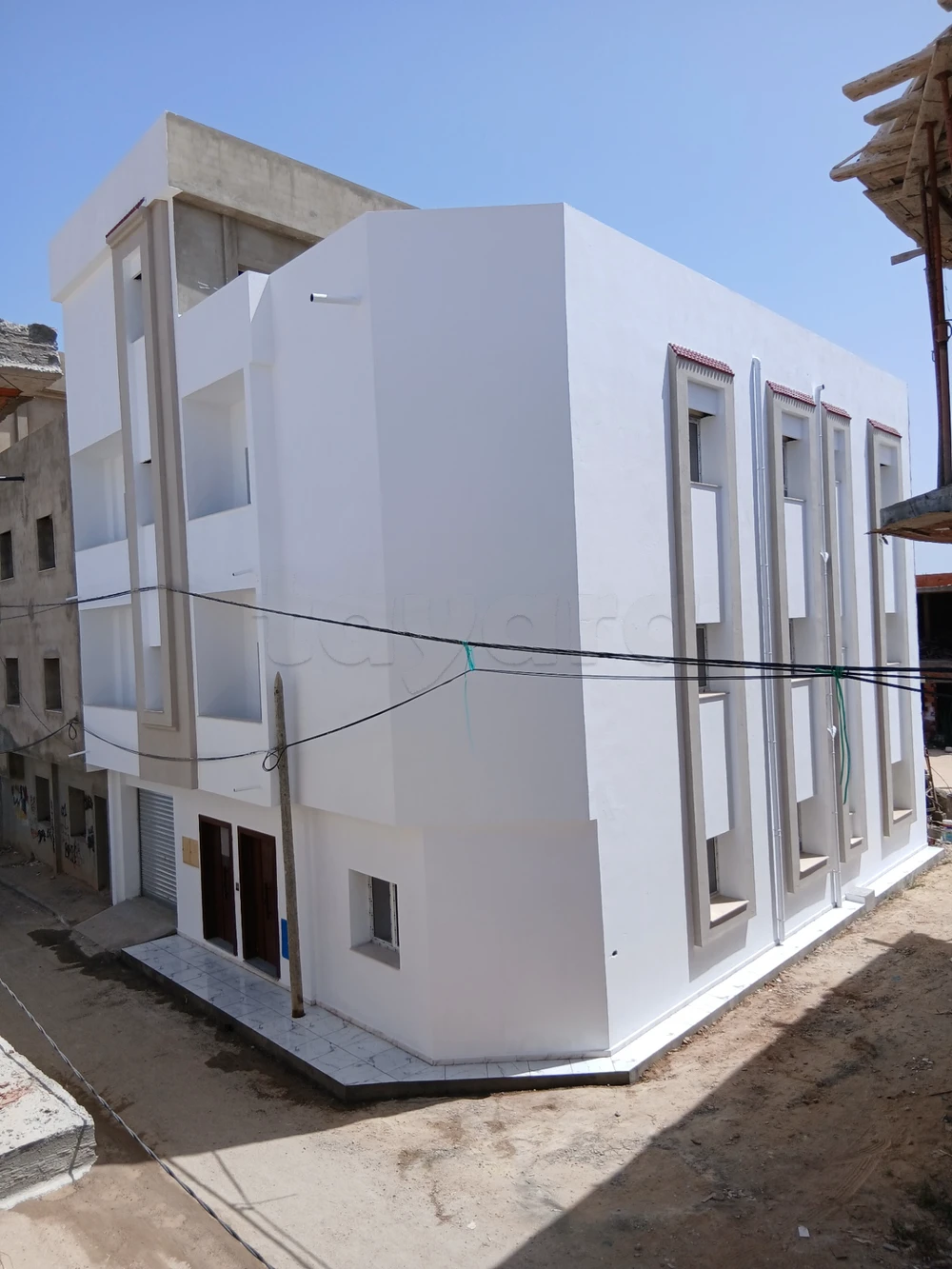Immeuble neuf 3 appartements plus garage