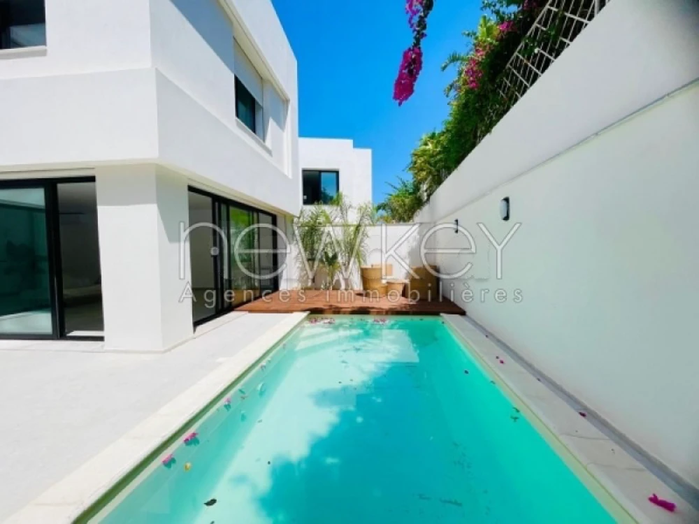 Duplex neuf avec piscine s+3 à Gammarth