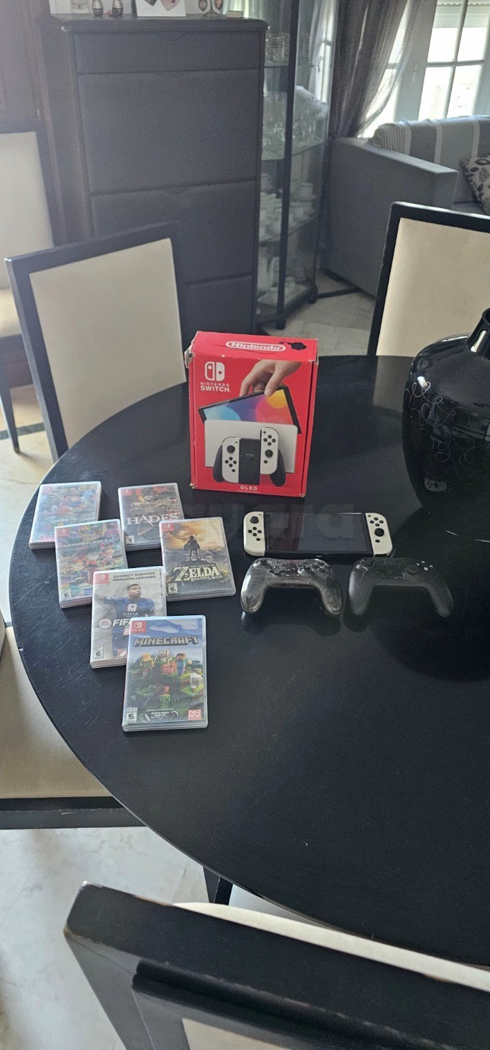 Nintendo Switch OLED + 6 jeux + accessoires – 1890 DT