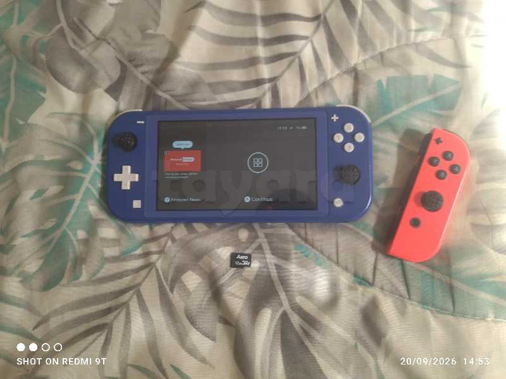nintendo switch lite avec joy-con et carte mémoire 32 Gb