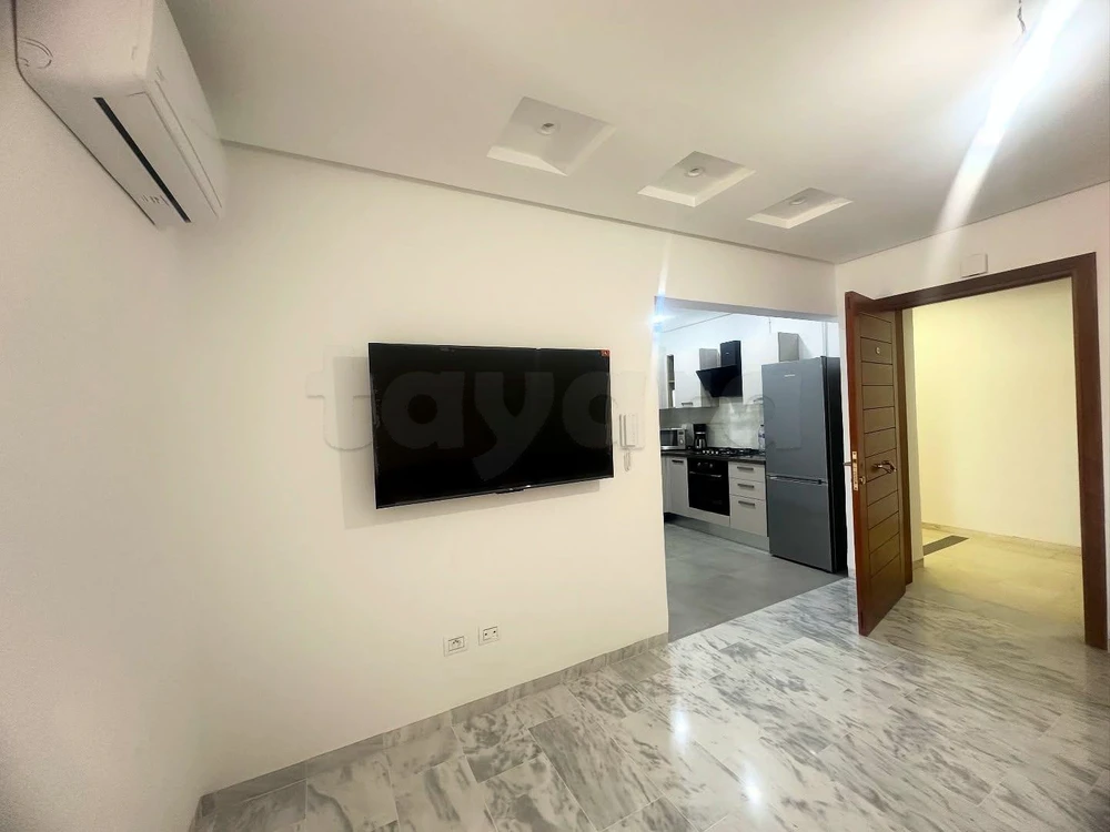 A louer un bel appartement S+2 bien meublé avec place parking à sahloul 4