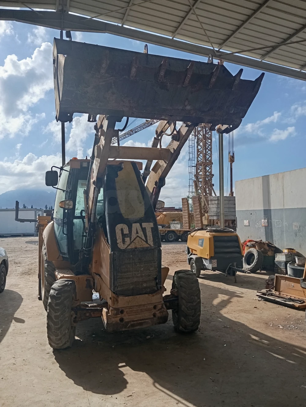 Tractopelle caterpillar 428e