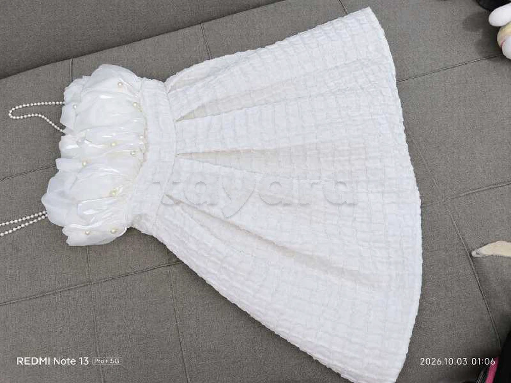 Robe blanche Vaguan Hanh