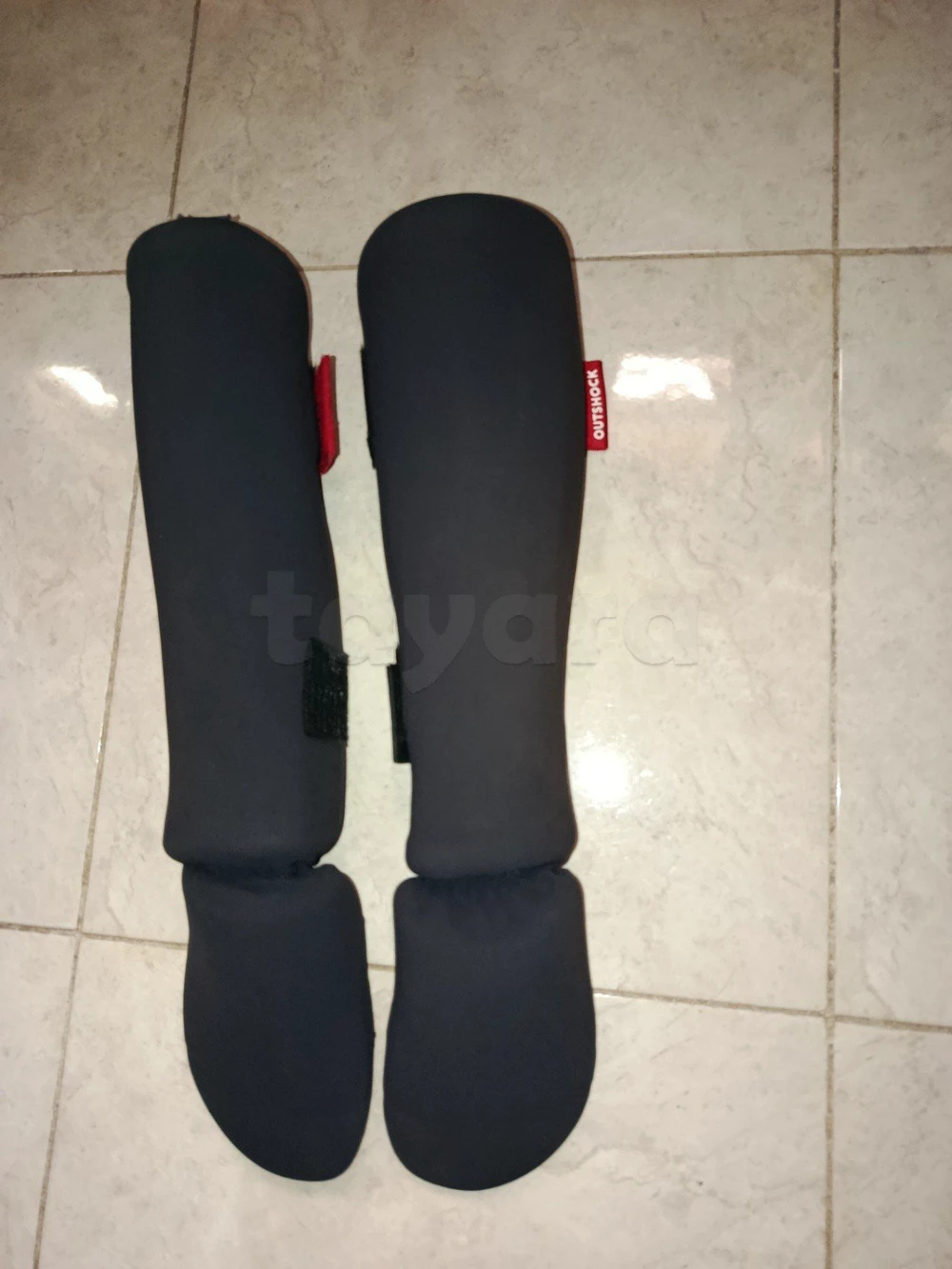 Protège tibia et pied Outshock