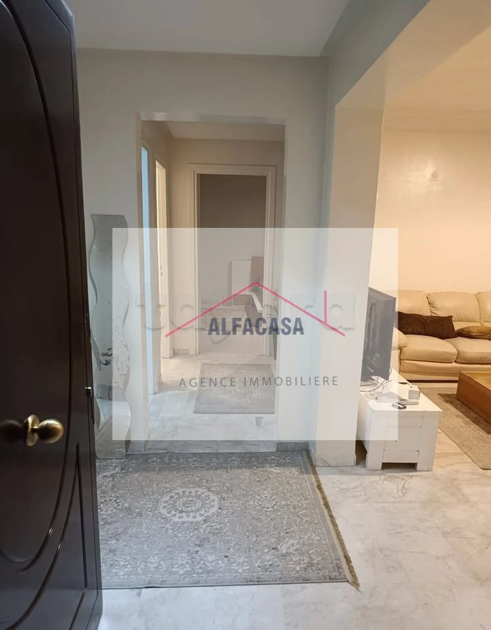 À LOUER UN APPARTEMENT S+2 HAUT STANDING MEUBLÉ A CITÉ EL WAHAT L'AOUINA.